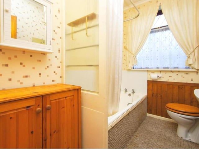Whether you fancy a bath or a shower, the bungalow can oblige. A three-piece suite comprises a panelled bath with electric shower over, a low-level WC and a wash hand basin with splashback. There is also a radiator and a double-glazed, frosted window to the side of the property.