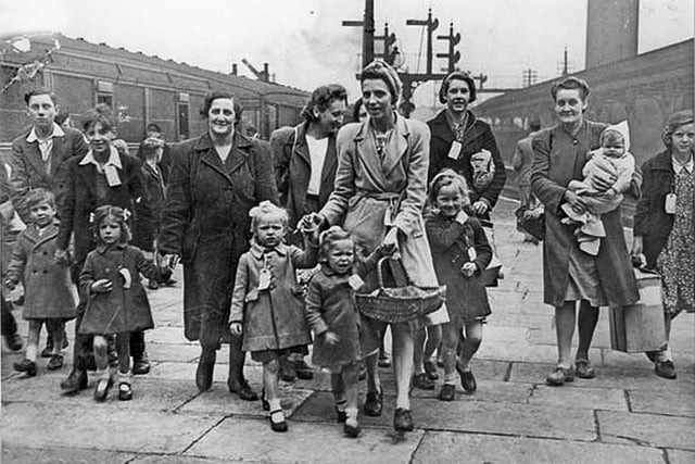 Evacuee mothers and their children at Sheffield Victoria Station