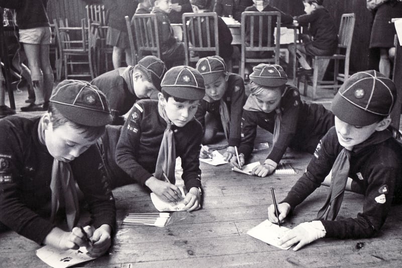 Testing their abilities against each other were the Chesterfield and District Cub Scouts at their annual contest held at the Trinity Institute.  Picture shows members of the 3rd Brampton Pack as they get down on the floor to do sketching in one of the events on 10th October 1970