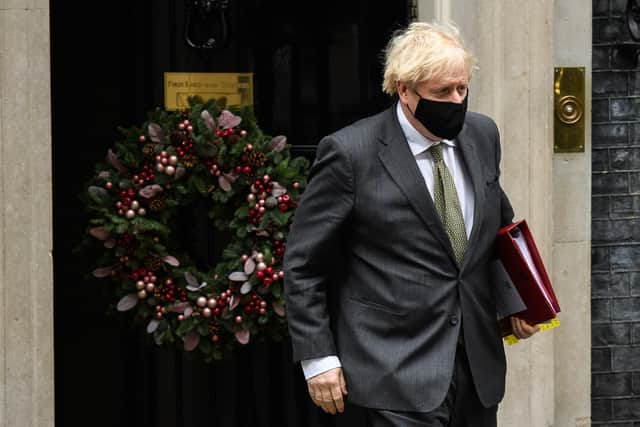 Prime Minister Boris Johnson will update MPs on the new national lockdown controls – which includes closing schools– before a vote this evening.