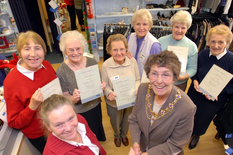 Who recognises these long service people pictured at the Marie Curie shop in 2006 with Mayoress Alice Malcolm?