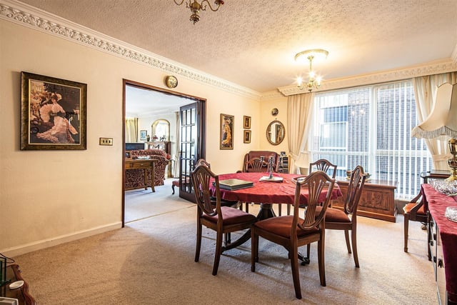 The dining room is located in the centre of the apartment, just at the end of the hall.