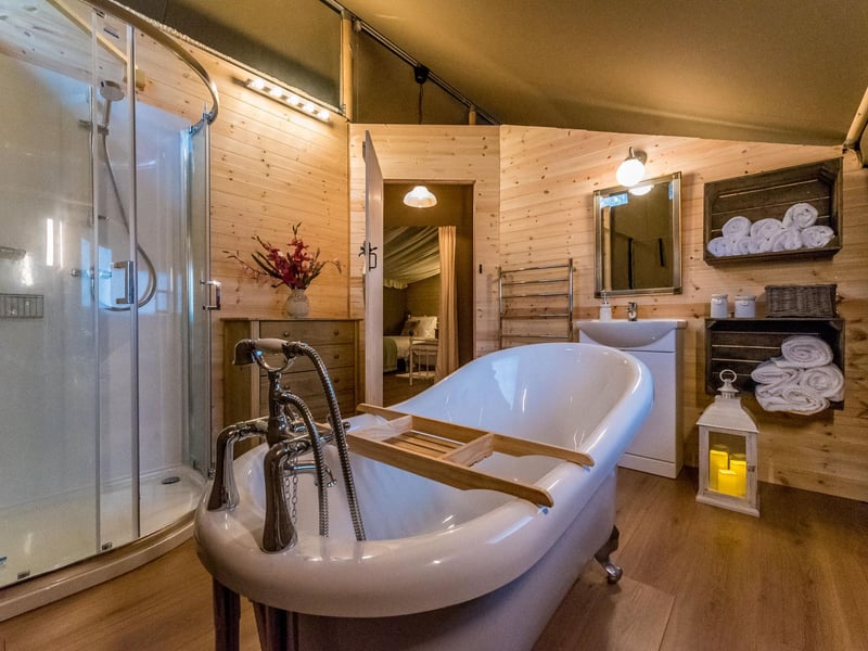 The staycation comes with a roll top bath which looks out over the woodland views.