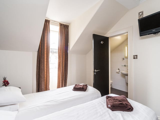 The hotel currently houses 10 letting bedrooms and dorms, including this twin room