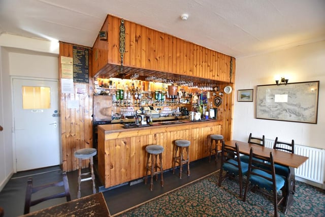 The hotel bar has dining space where meals are served to residents and locals alike