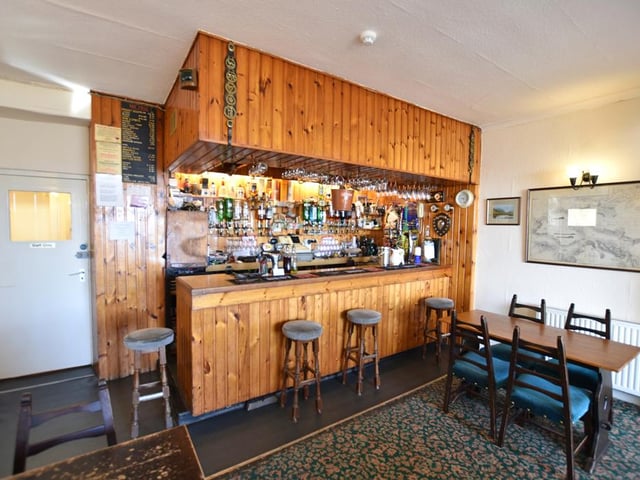 The hotel bar has dining space where meals are served to residents and locals alike