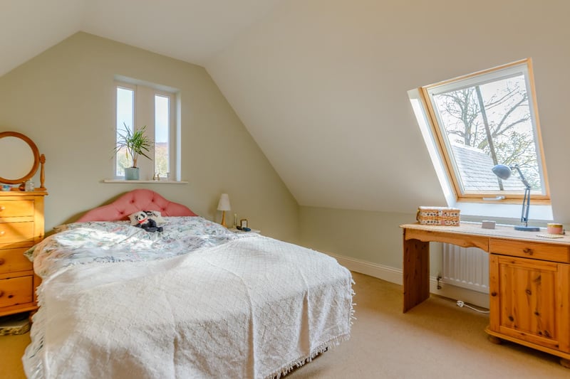 Two additional well-proportioned bedrooms are located on the second floor.