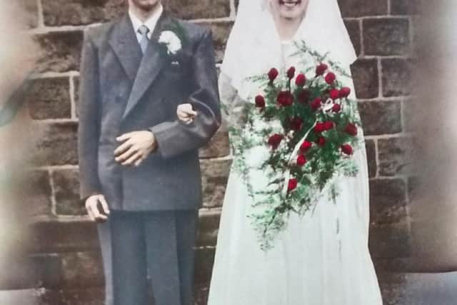 The couple pictured on their wedding day in 1955