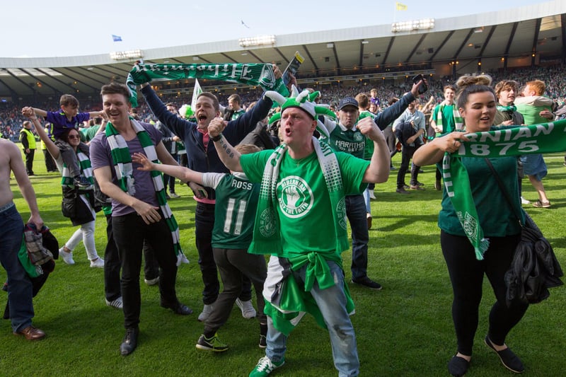 Fans celebrated on the pitch after David Gray's late winner. Picture Robert Perry