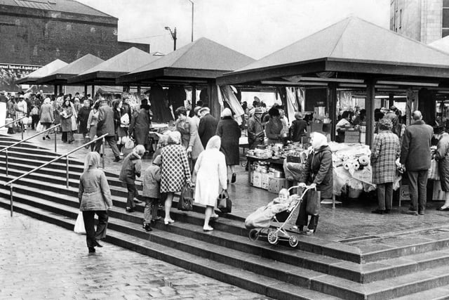 A busy open air Setts Market, Exchange Street, adjacent to the Sheaf Market Hall, Sheffield, pictured in 1974