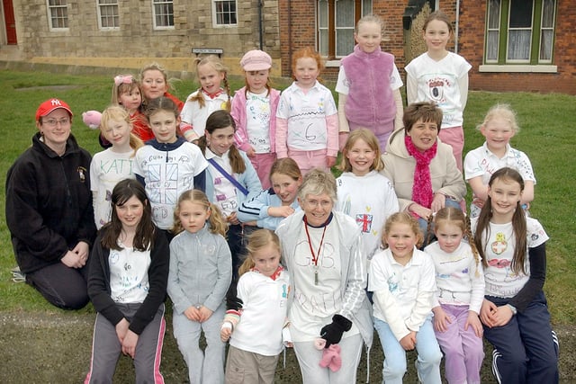 A Girl Guide run around the church 16 years ago. Can you spot someone you know?
