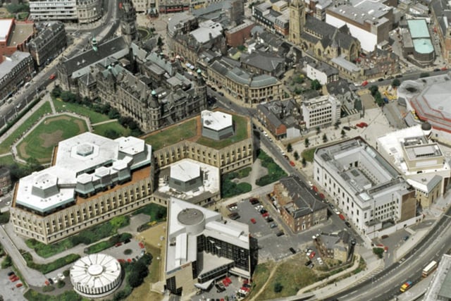 Sheffield city centre viewed from above in 1994, showing the Town Hall and extension, Register Office, Central Library, Novotel, Lyceum and Crucible Theatre, Arundel Gate, foreground, Surrey Street and Norfolk Street, centre, and St Marie's RC Church, top right