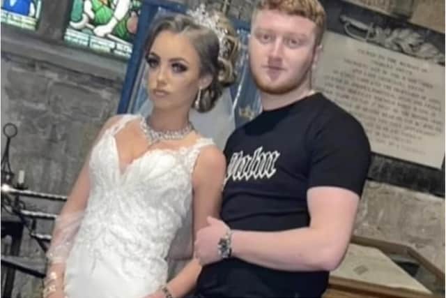 The couple have gone viral over the groom's choice of clothing.