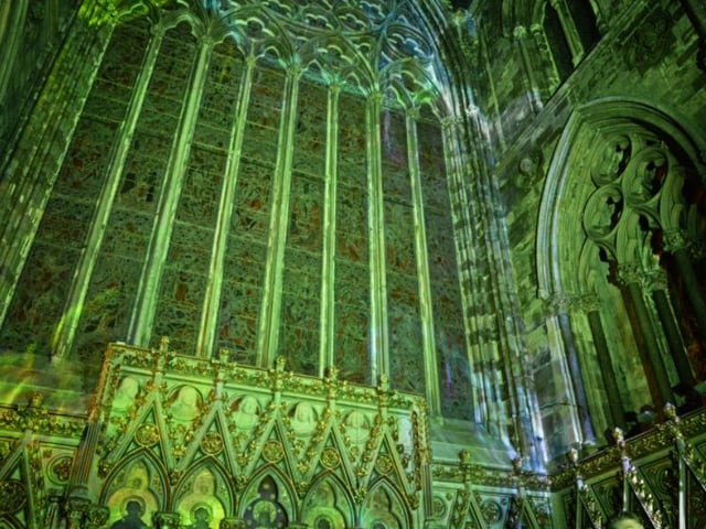The stained glass of the church was lit up by the show.