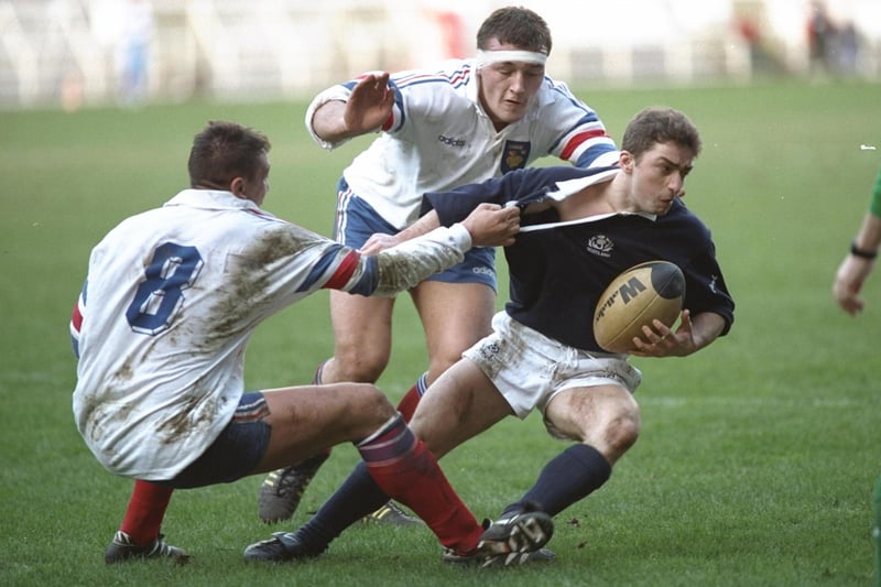 February 18, 1995: France 21, Scotland 23
Former Melrose player Bryan Redpath being held by Phillipe Benetton of France at the Parc des Princes in Paris (Photo: Pascal Rondeau/Allsport/Getty Images)