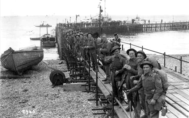 Royal engineers embark from Beach pier, June 1944.
