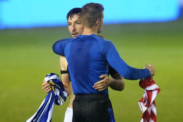 Morgan Fox swaps shirts with Joost Van Aken after Sheffield Wednesday drew with Stoke City. Pic Steve Ellis