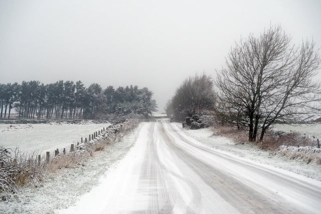 Tricky driving conditions on country lane.