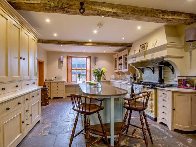 There is a hand-built Chalon kitchen which is fitted with an extensive range of wall, drawer and base units; silestone work surfaces; integrated Miele appliances; and a four-oven aga.
