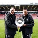Darren Currie (R) and Graham Coughlan with Sheffield United's PDL North Trophy: Andrew Yates / Sportimage