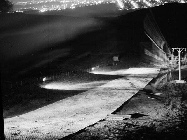 Floodlights light up Hillend before skiers take to the slopes in 1966.