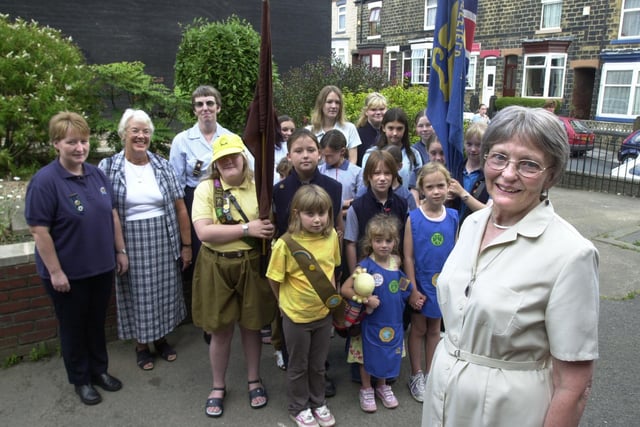Pictured in 2003 at the Hillsborough Trinity Methodist Church, Middlewood Road, Sheffield, where the Golden Jubilee Parade Service for the Girl Guides, Brownies and Boys Brigade was held. Seen  is the current Guides group, with founder Margaret Wain (right).