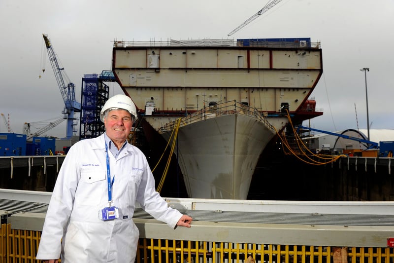Tom Gifford at the front HMS Queen Elizabeth in December 2012 - when the future Royal Navy flagship was starting to take shape. Picture: Allan Hutchings (123920-409)
