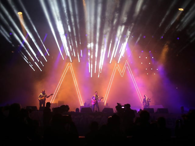 The Arctic Monkeys perform on the Pyramid Stage at the Glastonbury Festival on June 28, 2013