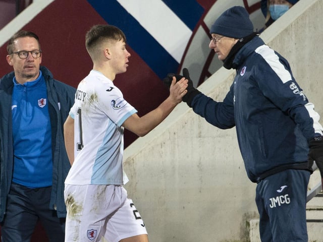 Kai Kennedy is congratulated after being subbed by Raith Rovers manager John McGlynn.