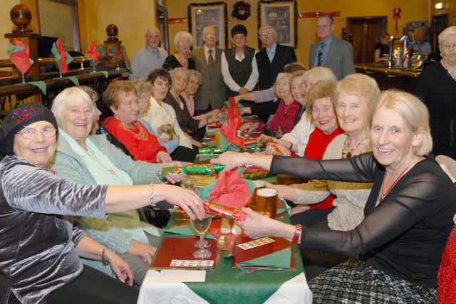 Members of the South Shields Pensioner Assocation seem to be loving their Christmas party at The Office in 2009.