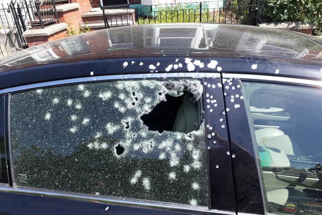 A car window which was shot at in Nether Edge.