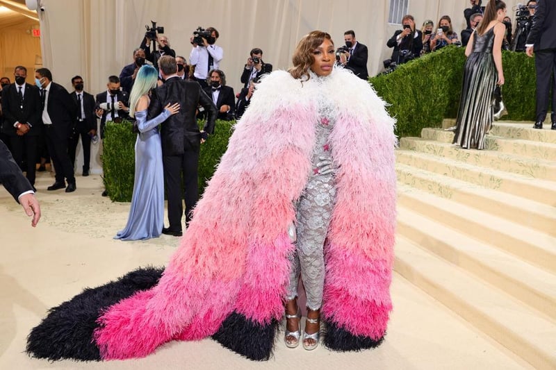 Tennis champion Serena Williams attended the Gala in a silver Gucci bodysuit and feathered pink ombre cape.