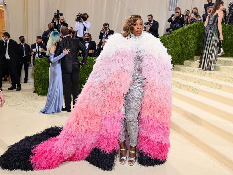 Tennis champion Serena Williams attended the Gala in a silver Gucci bodysuit and feathered pink ombre cape.