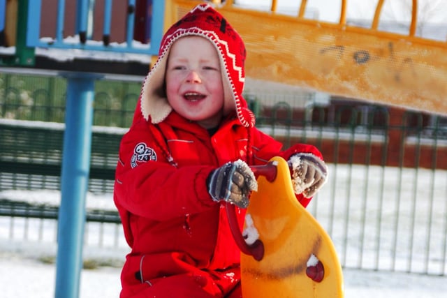Snow fun in Barnsley. This child still enjoyed playing in the park in 2010 despite the weather. Photo by Dean Atkins.