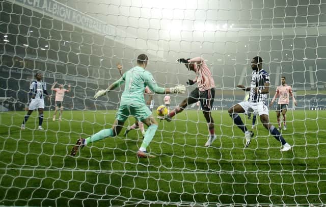 Sheffield United's Lys Mousset misses from close range in their defeat at West Brom (Andrew Boyers/Pool via AP)