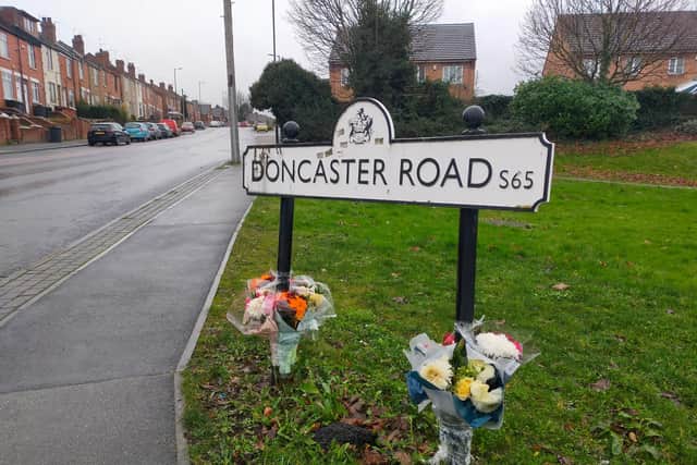 Flowers tributes left at the scene of Doncaster Road close to where Fatjon was found unconscious.