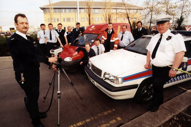 PC Steve Cartwright (left) and PC Steve Swinbourne, from Doncaster Traffic Police, with  some of the Royal Mail van drivers at the Doncaster Mail Centre in 1998