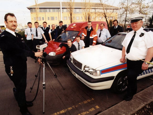 PC Steve Cartwright (left) and PC Steve Swinbourne, from Doncaster Traffic Police, with some of the Royal Mail van drivers at the Doncaster Mail Centre in 1998