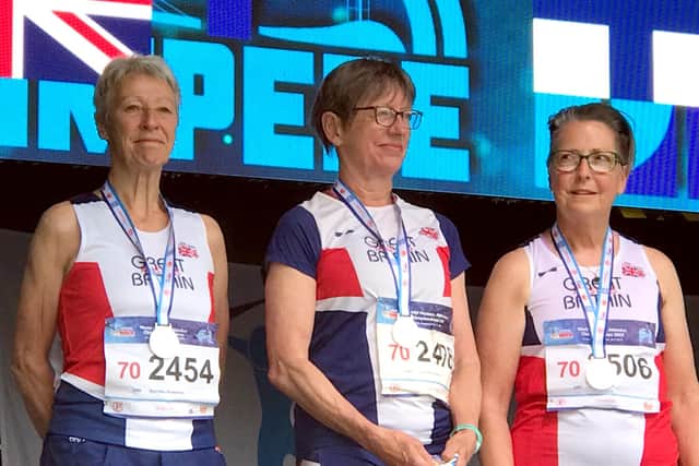 Dot Kesterton (left) with colleagues from the silver medal W70 100m relay team at Tampere in Finland in July 2022.