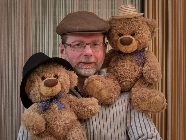 Christian Kneidinger with John James and Bob the teddy bears. 
These adorable teddy bears could be the world's most well-travelled cuddly toys - as their photographer owner has chronicled their adventures in 27 different countries. Christian Kneidinger, 57, has been travelling with his teddy bears, named John and Bob since 2014 - and his taken them to some of the world's most famous landmarks. The teddy bears have dressed up in traditional Emirati clothing to visit the Sultan's Palace in Oman, and have braved the cold on a glacier on Lofoten Island in Norway.