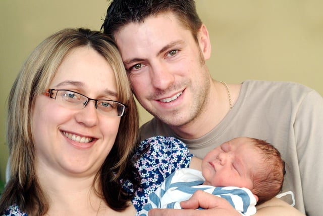 Judith and Tristan Thompson of Kirkby proudly show off their newborn son Joshua Brian Peter Thompson who was the first baby to be born at the Dukeries on New Years' Day, checking in at 9.04am. Weighing 8lb, he is their first baby.