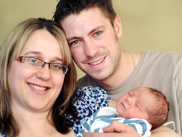 Judith and Tristan Thompson of Kirkby proudly show off their newborn son Joshua Brian Peter Thompson who was the first baby to be born at the Dukeries on New Years' Day, checking in at 9.04am. Weighing 8lb, he is their first baby.