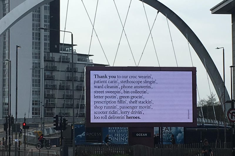 An electronic billboard on the River Clyde uses verse to thank key workers.