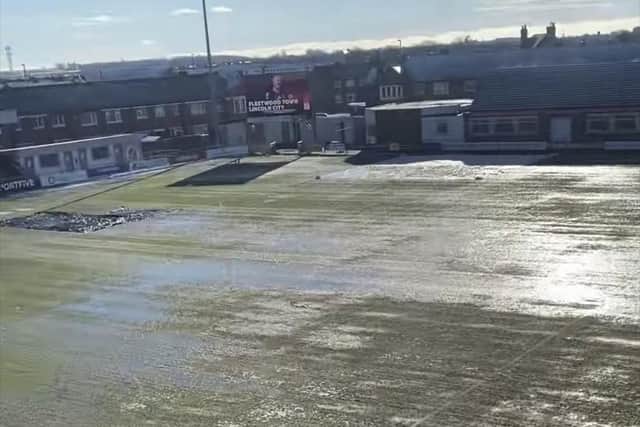 Fleetwood Town's Highbury pitch is covered in water after heavy snowfall over the weekend.