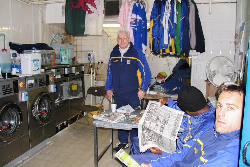 Barry Harris and former goalkeeper Sander Westerveld hang out in the laundry room at Fratton Park.  Picture: Habibur Rahman