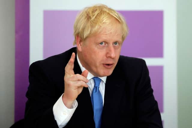 A leaked letter to civil servants by Boris Johnson set out his intentions to slash the service by 20 per cent, amounting to 91,000 staff. (Photo by Kirsty Wigglesworth - WPA Pool/Getty Images)