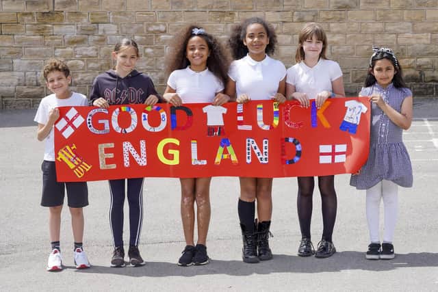 Pupils from Dominic Calvert-Lewin's former school, Malin Bridge Primary School, show their support for England in Euro 2020. Connor Hanson, Maggie Pulleng, Sasha Lewin, Robyn Lewin, Gracie Walsh and Anisah Khan.  Picture Scott Merrylees