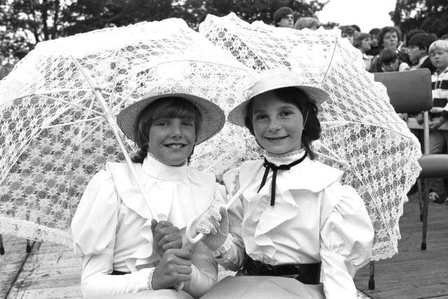 Alison Kerr and Heather Grant under their parasols enjoying Bo'ness Fair Day
