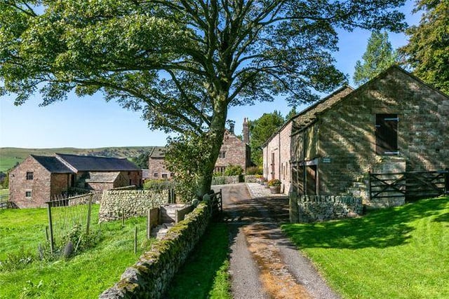 This five bedroom Grade II listed farmhouse also comes with Grade II listed barns. Marketed by Savills, 01625 684627.