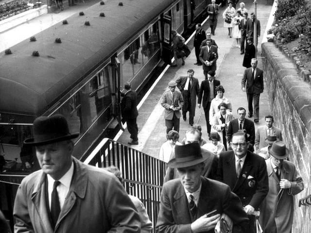 Travellers disembark at Edinburgh's Morningside railway station in 1961 - the station, which opened in 1884, was closed down in 1962 although the line remains and is used for freight
